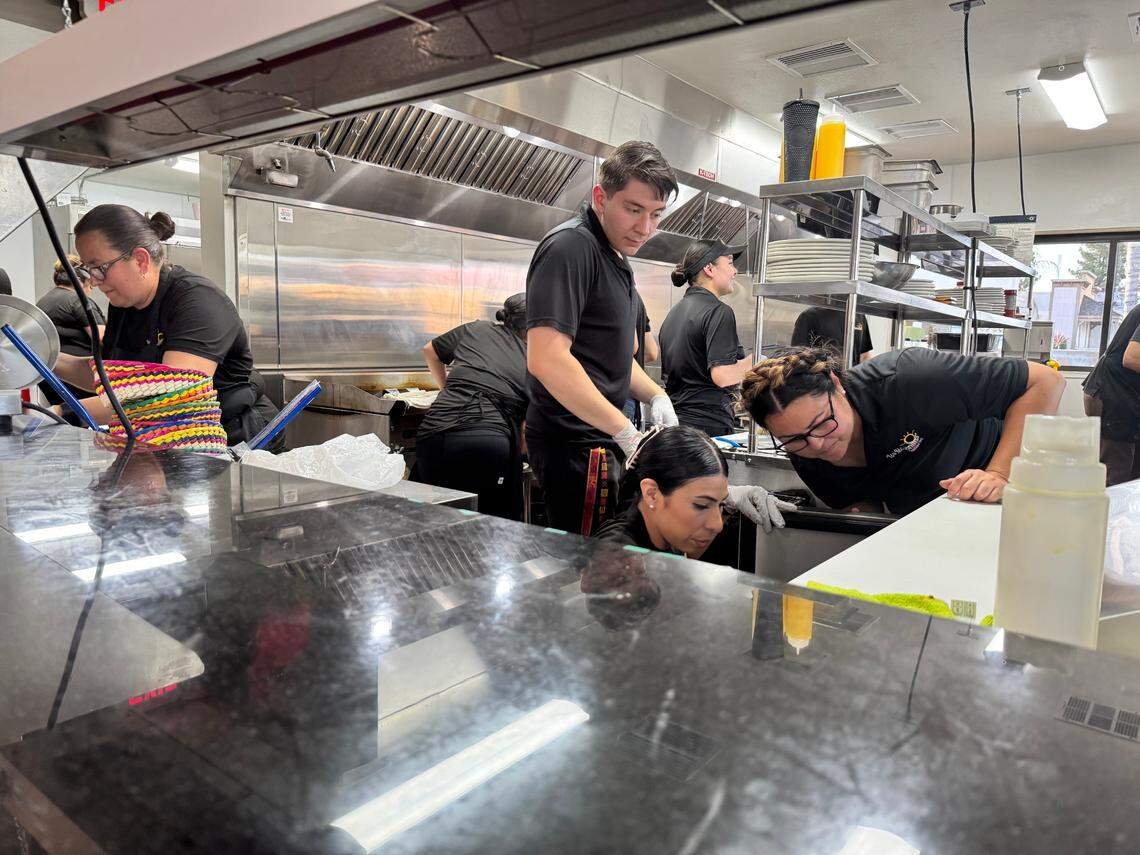 Kitchen staff at Las Mañanitas in Clovis during the height of dinner time.