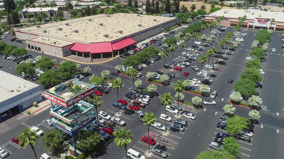 Costco Wholesale, left, shown at its current location near WinCo Foods on West Shaw Avenue at Blythe Avenue, wants to open a big new store in northwest Fresno, at Herndon Avenue and Riverside Drive.