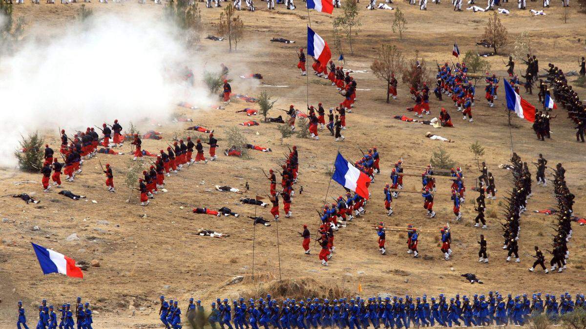Indigenous Zacapuaxtlas recreate the historic Batalla de Puebla in 2011 during festivities held to commemorate the May 5, 1862 victory by the Mexican army against the French.