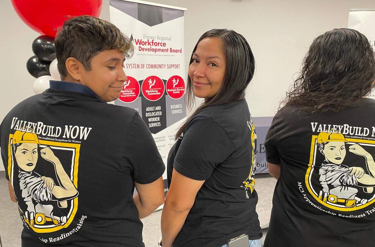 ValleyBuild NOW graduates pose in their Rosie the Riveter-inspired shirts during on October 12, 2022. The ValleyBuild NOW pre-apprenticeship program prepares women for careers in construction.