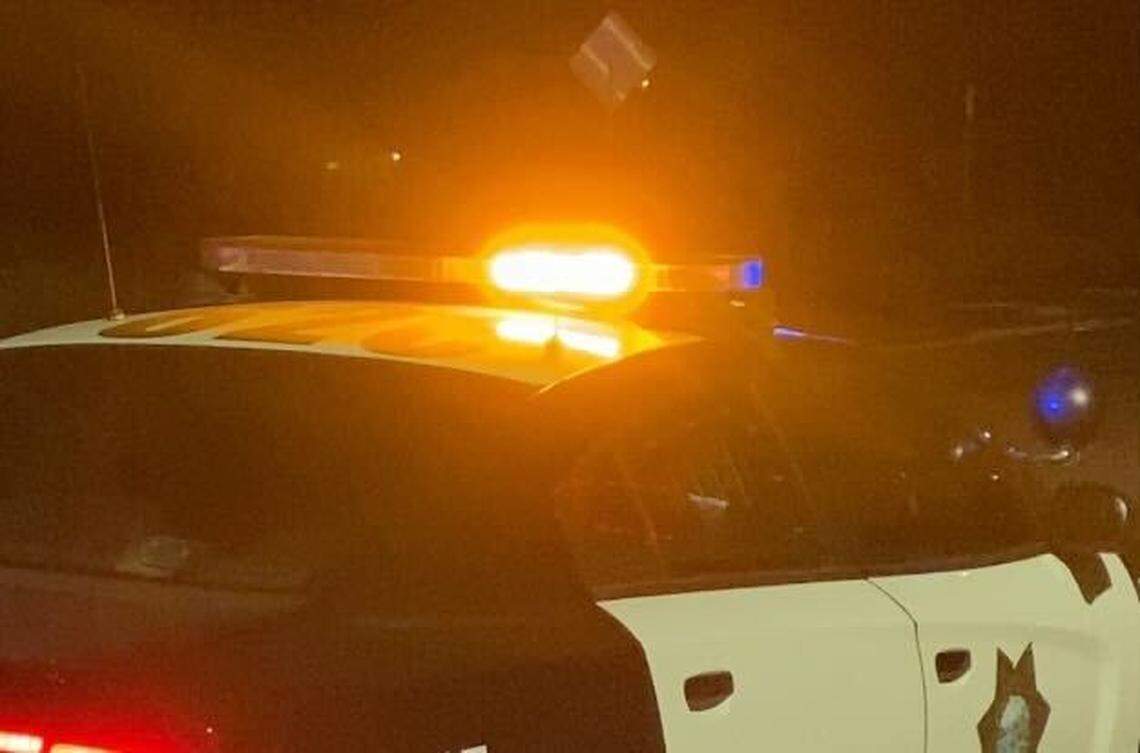 The lights of a Fresno police cruiser around 10:30 p.m. Tuesday, March 5, 2022, near Maple and McKinley avenues following a robbery and stabbing.