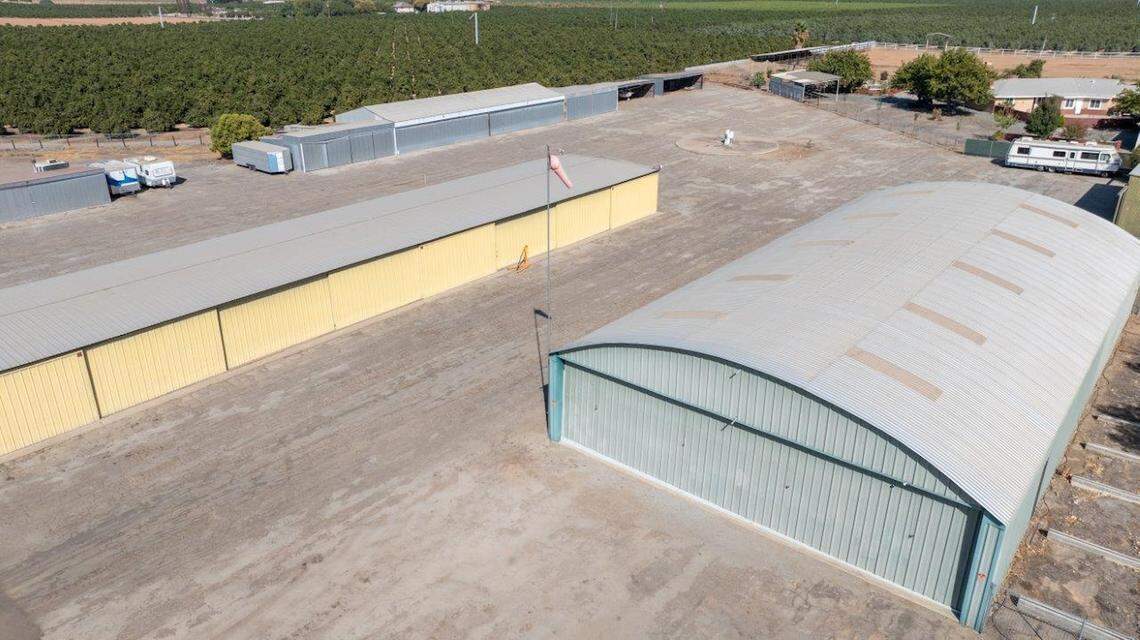 Eckert Field, a small airport facility in the small South Valley town of Strathmore, is for sale for $1.275 million. There are 20 hangars on the property, varying in condition