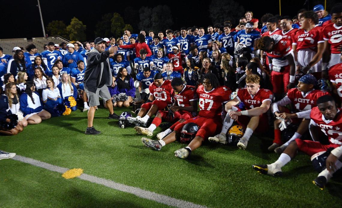 Both City and County teams gather for a photograph at the end of the City/County All-Star football game held at McLane High’s stadium Friday night, June 17, 2022 in Fresno. The game ended 21-21.