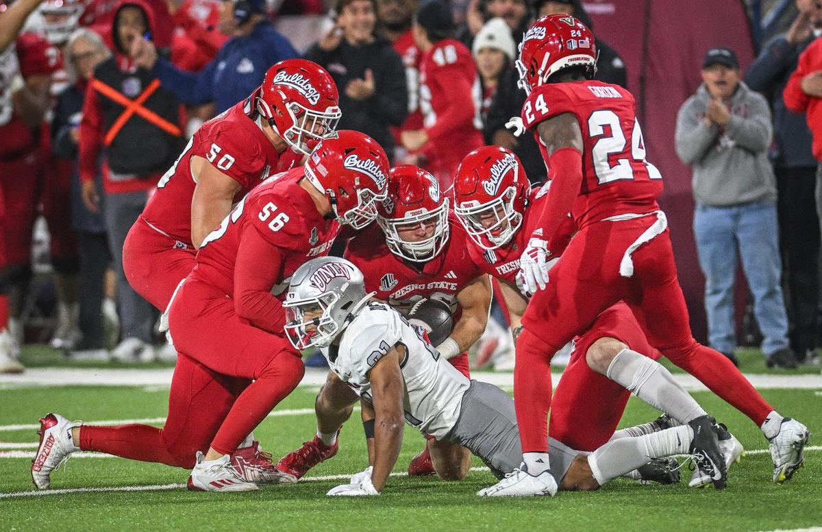 Fresno State recovers a fumble on a punt against UNLV in the second half of their game at Bulldog Stadium on Saturday, Oct. 28, 2023.