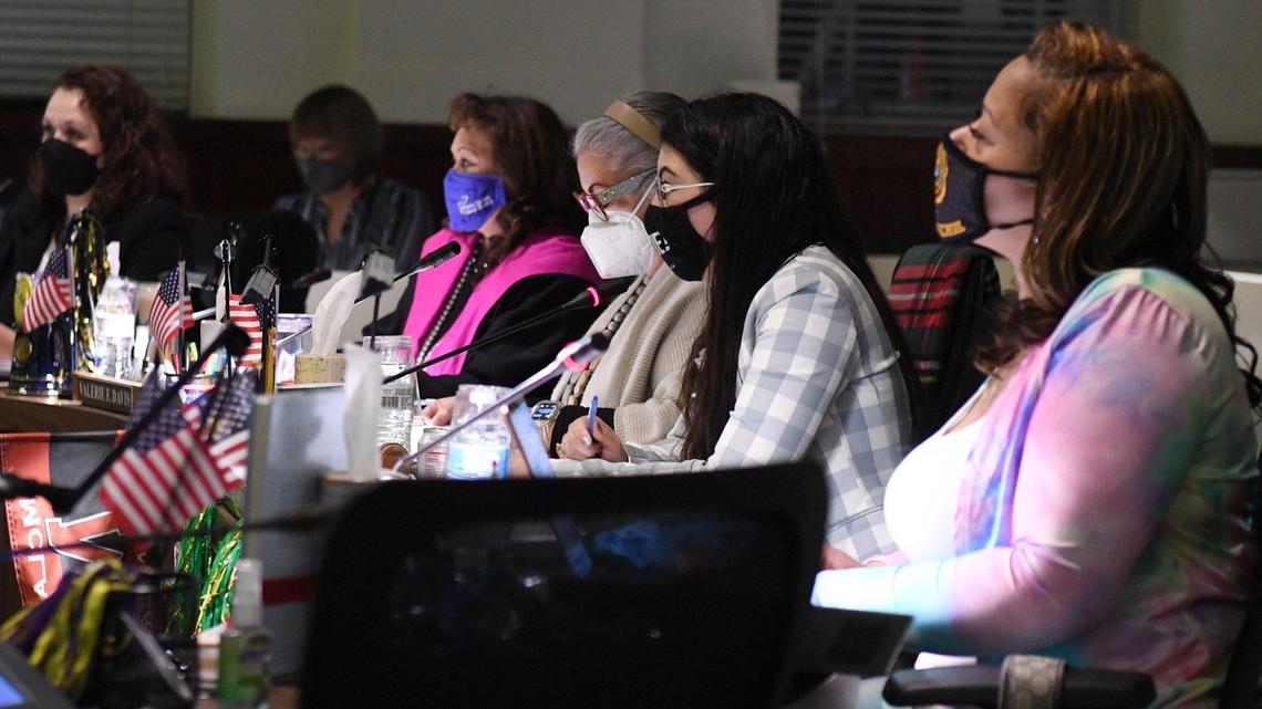 School board members left to right, Claudia Cazares, Valerie Davis, Veva Islas, Elizabeth Jonasson Rojas andKeshia Thomas listen during the Fresno Unified School Board meeting Wednesday night, Feb. 16, 2022 in Fresno.
