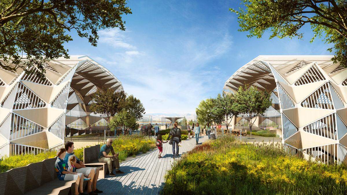Una terraza elevada y ajardinada sirve de puente sobre las vías del tren de alta velocidad en esta representación artística de una futura estación de pasajeros en el Valle Central.