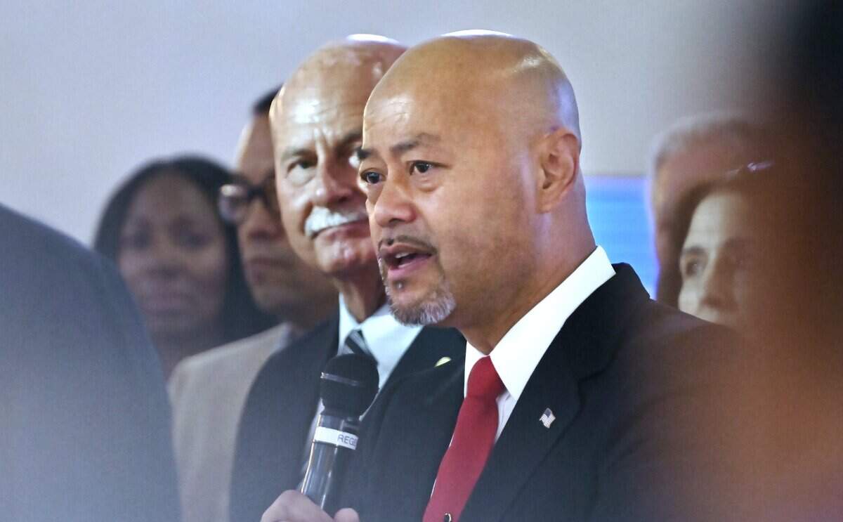With Fresno Mayor Jerry Dyer listen at the left, Clovis Mayor Vong Mouanoutoua announces the launch of his campaign for Fresno County Board of Supervisors District 5 during an event at the Regency Event Center Friday, June 12, 2026 in Clovis.