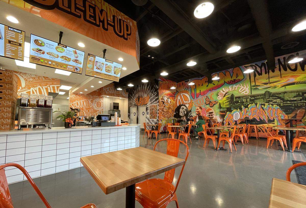Roll-Em-Up Taquitos with its colorful reggae vibe has opened at The Marketplace at El Paseo near Herndon Avenue and 99. Photographed Wednesday, Dec. 17, 2025 in Fresno.