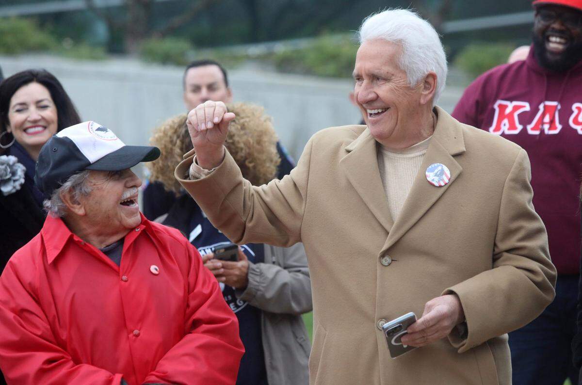 Congressman Jim Costa shares a laugh with Venancio Gaona during the Martin Luther King Jr. Unity March in front of Fresno City Hall on Jan. 15, 2024. / El congresista Jim Costa se ríe con Venancio Gaona durante la Marcha de Unidad de Martin Luther King Jr. frente al Ayuntamiento de Fresno el 15 de enero de 2024.