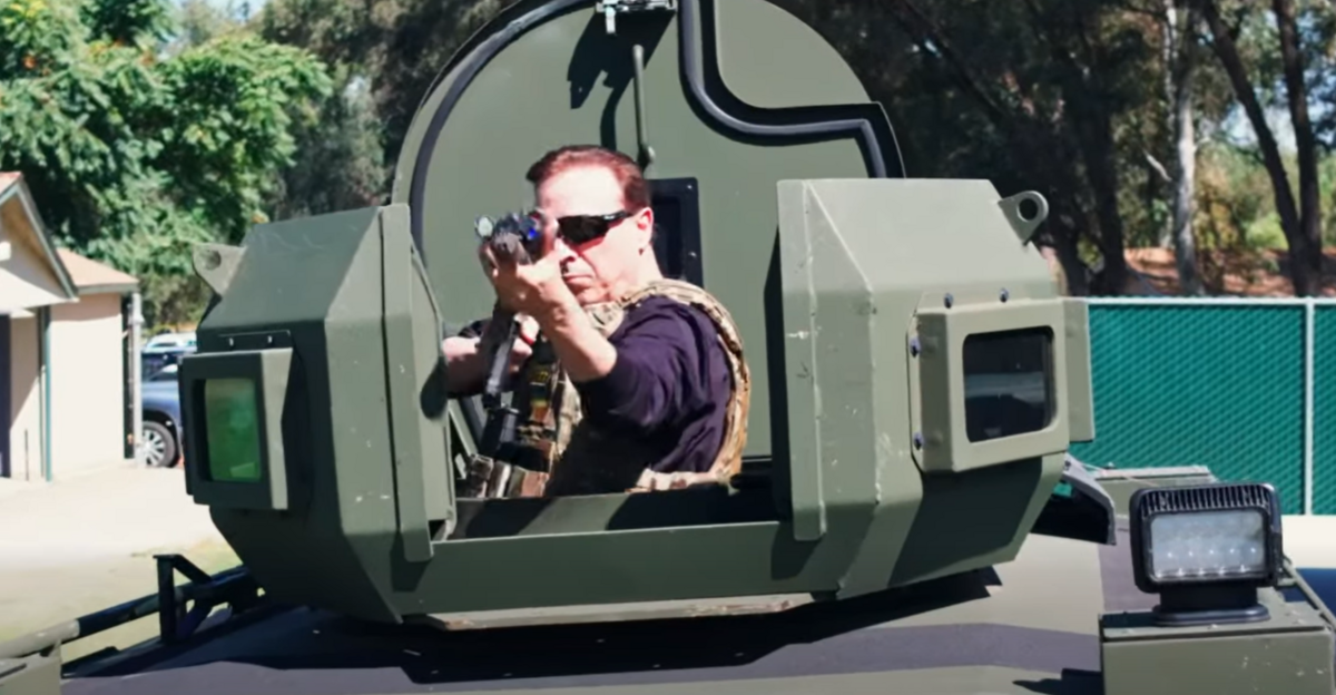 Fresno County Board Chair Garry Bredefeld points a firearm in a promotion video for the State of the County event hosted with the Fresno Chamber of Commerce.