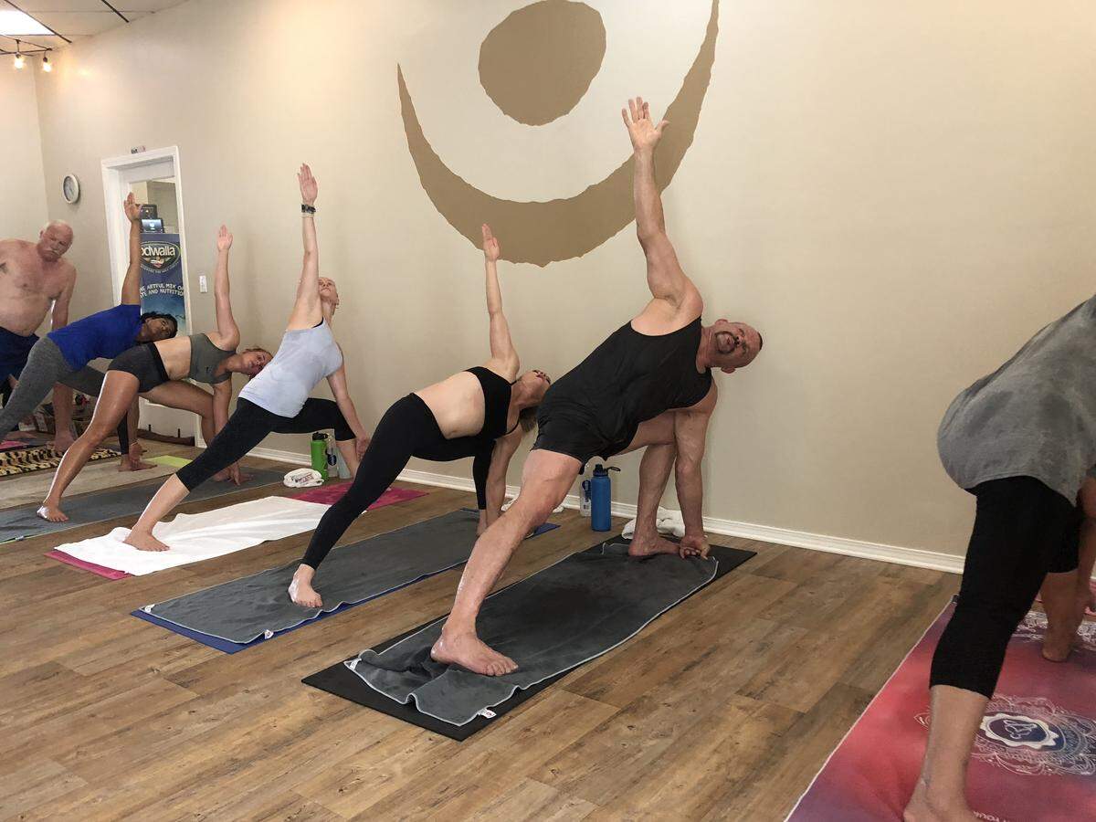 Mixed martial artist fighter Chuck Liddell mixed up his workout routine while in the Fresno area Tuesday and participated in an hour-long hot yoga class at Blue Moon Yoga.