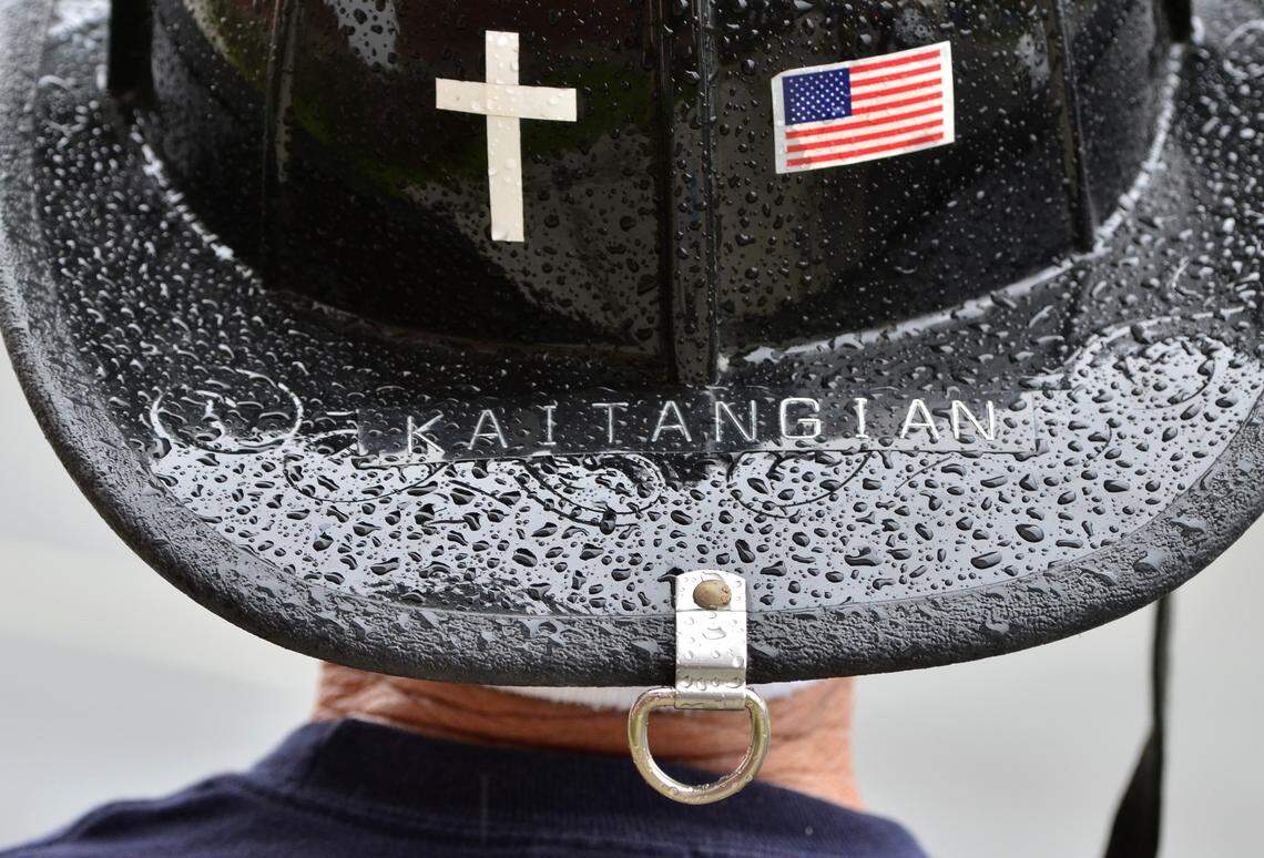 The helmet of Mickey Kaitangian during a rainy Fill-the-Boot fundraiser in 2012 for the Central Valley Muscular Dystrophy Association.