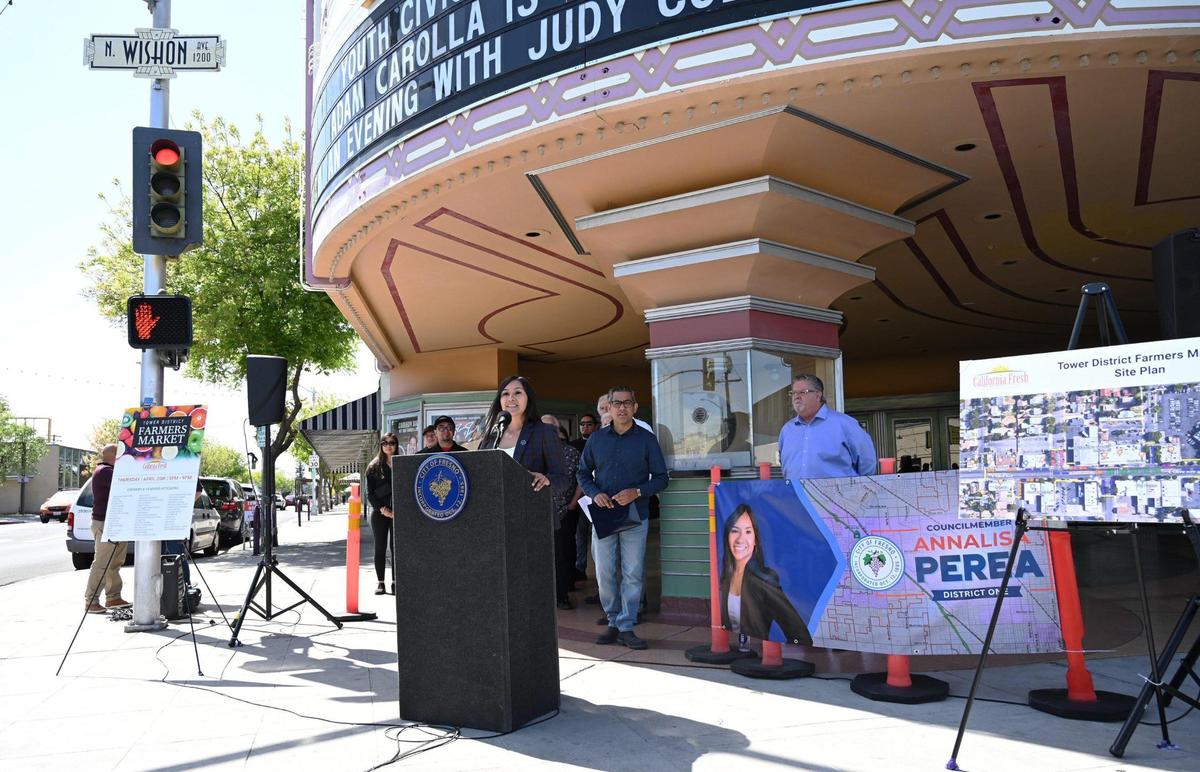 Fresno City Councilmember Annalisa Perea, center, announces the new Tower District Farmers Market to be held weekly starting April 20 on Olive Avenue during a press conference Wednesday, April 19, 2023 in Fresno. The market will take place from 5pm-9pm.