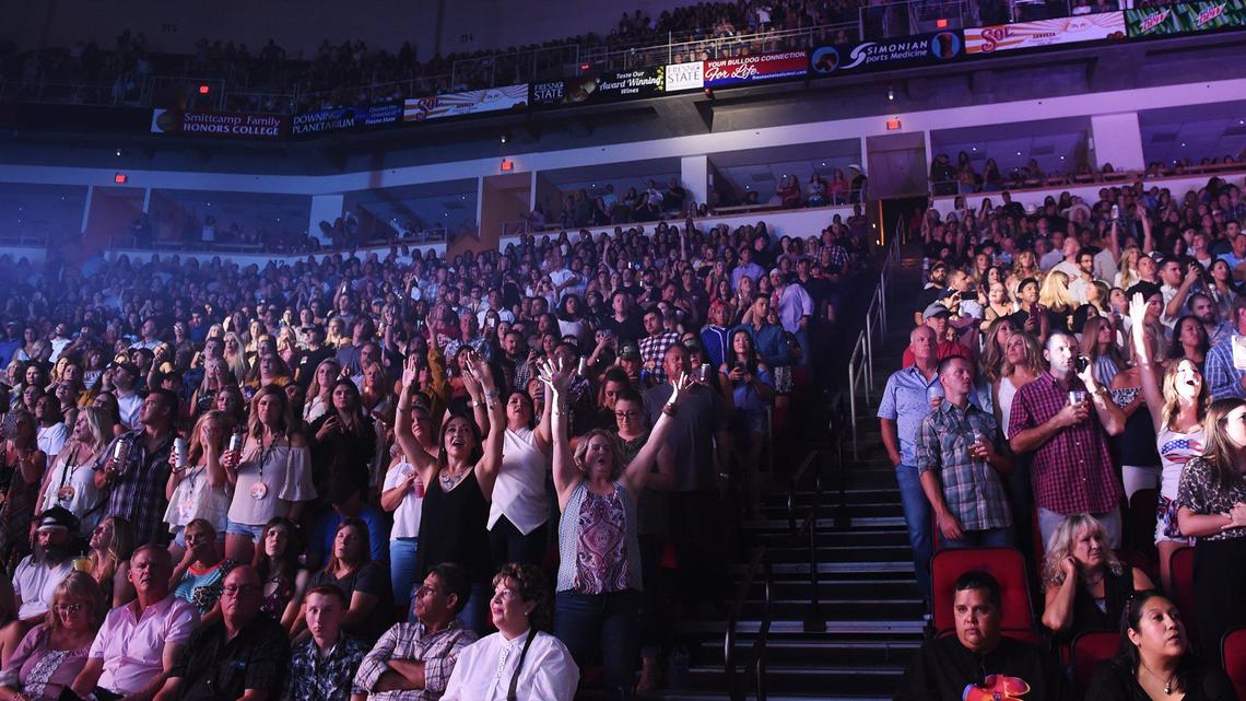 The crowd erupts as Luke Bryan performs at Fresno’s Save Mart Center in August 2019. A surge of new coronavirus cases in Fresno and across California in mid-2021 means indoor “mega events” such as concerts pose a risk for people who are not vaccinated against COVID-19.