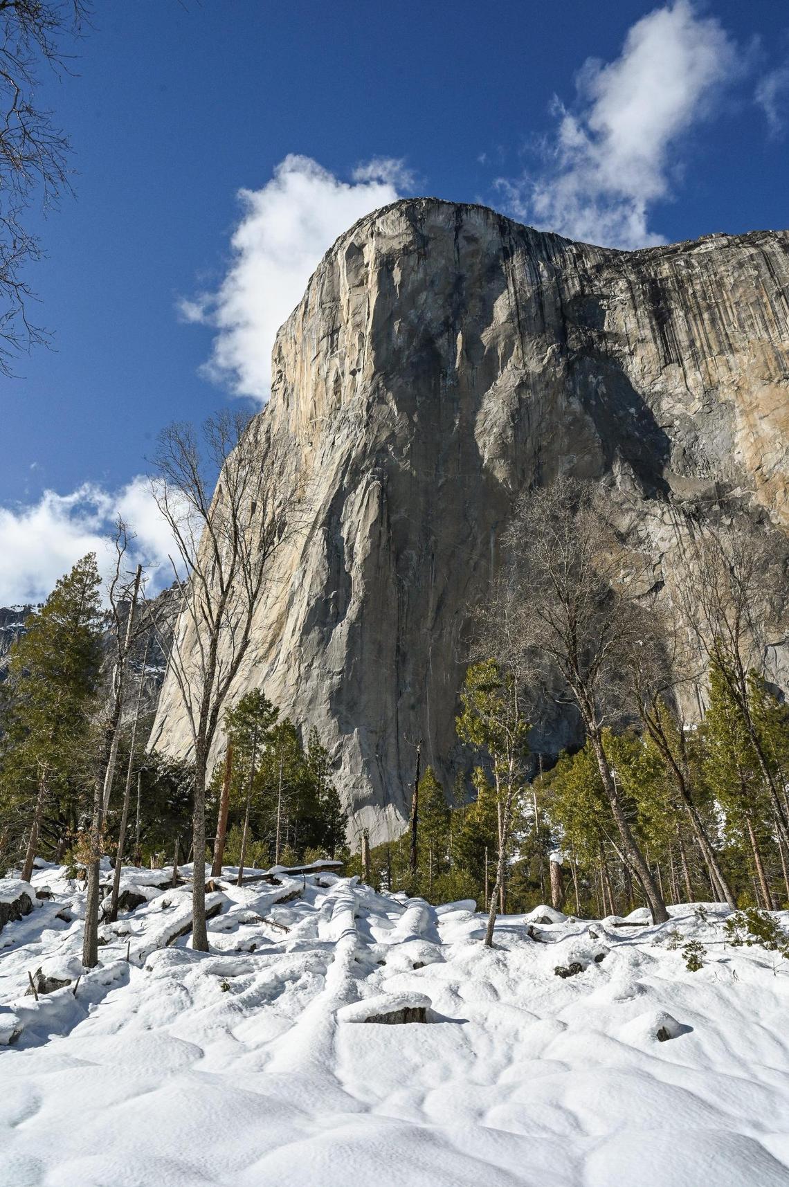 El Capitan stands out above thick blankets of snow after recent storms inundated the area and force officials to close the park to visitors.