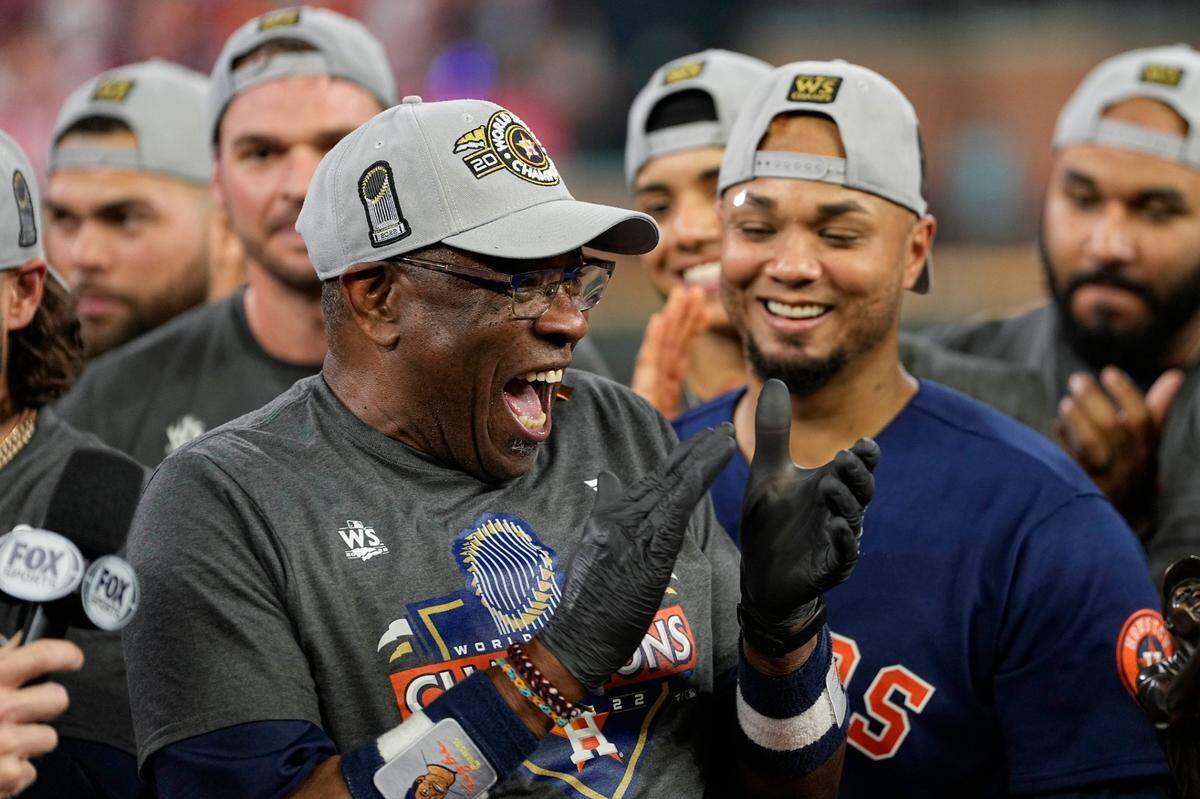 Houston Astros manager Dusty Baker Jr. and the Houston Astros celebrate their 4-1 World Series win against the Philadelphia Phillies in Game 6 on Saturday, Nov. 5, 2022, in Houston.
