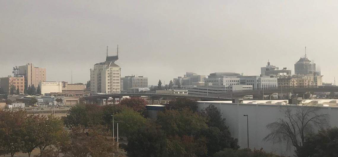 Grey, smoke-filled skies above downtown Fresno on Saturday, Nov. 10, 2018