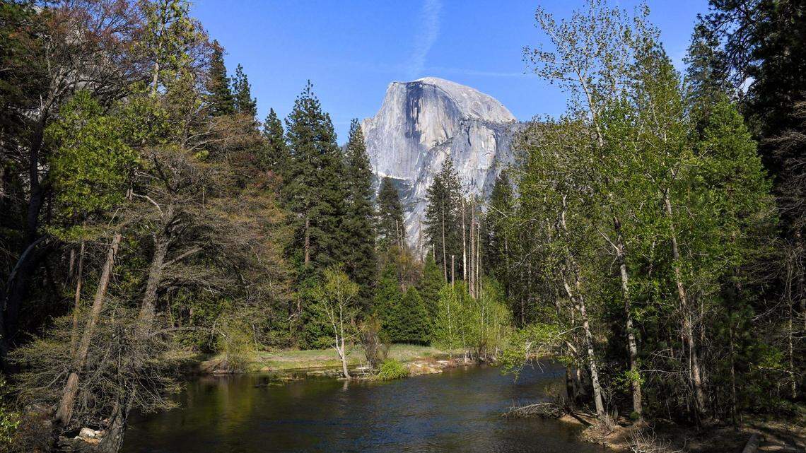 Yosemite National Park’s famous Half Dome comes into view from Sentinel Bridge on a spring day in 2021.