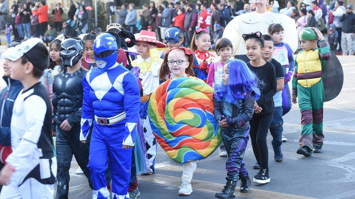 Before the pandemic. Students from Los Banos Elementary and Westside Union Elementary schools parade downtown, Wed., Oct. 31, 2019 as part of the annual Halloween parade. This year, residents will find other ways to celebrate Halloween.
