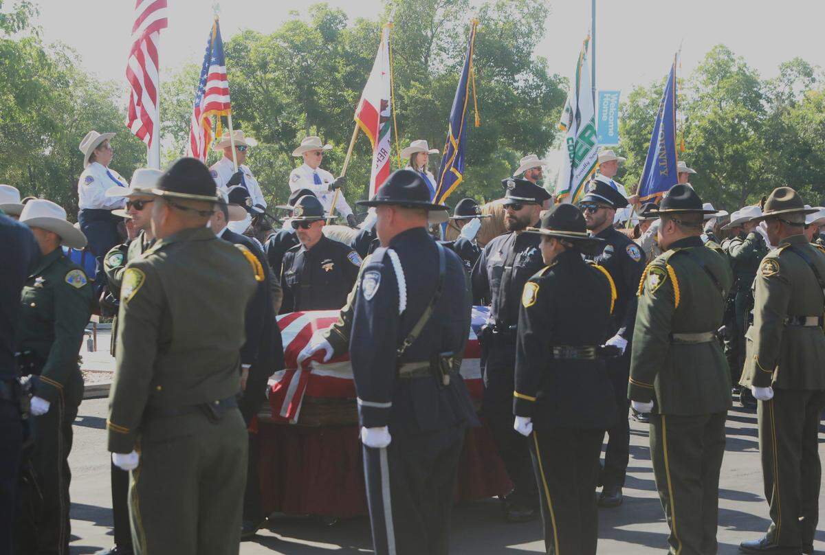 Family, law enforcement and community gathered Tuesday, April 28, 2026, in Visalia to remember Tulare County deputy Randy Hoppert’s service and sacrifice after the fatal April ambush in north Porterville.