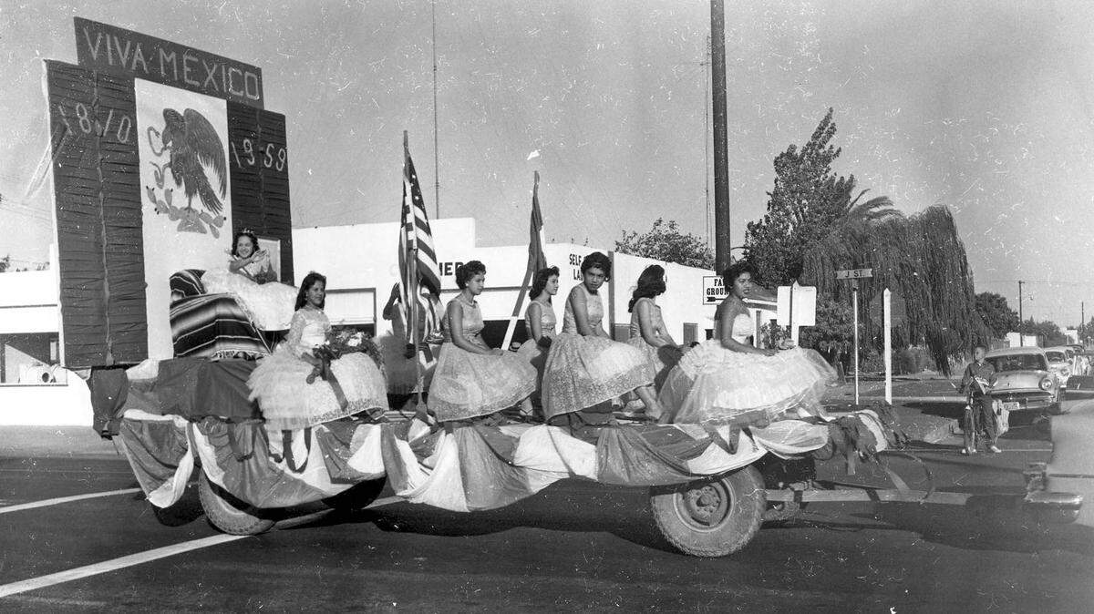 Mexican Independence Celebration on J Street near 13th Street, 1959. There were about 52 Mexican residents in Merced in 1880, and there was a section in Merced known as Spanish Town. It was south of the Central Pacific Railroad track on 15th Street between J and M Streets.