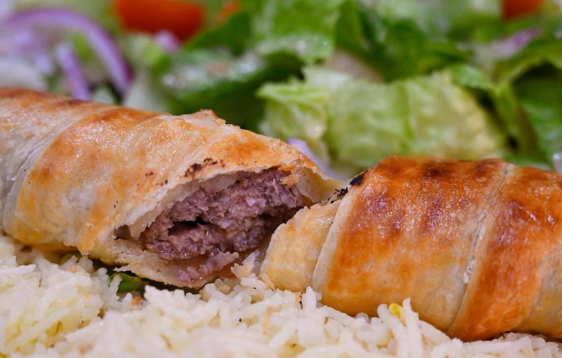 Beef in a blanket is one of the top offerings at the new Cheesy Bread House located in the same shopping center as Costco on West Shaw Avenue. Photographed Friday, June 23, 2023.