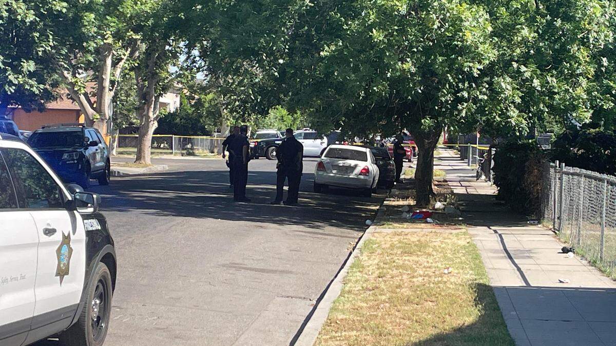 Fresno police seal off North Valeria Street south of Belmont Avenue on Thursday May 18, 2023, following a shooting in which a man in his 20s was wounded.