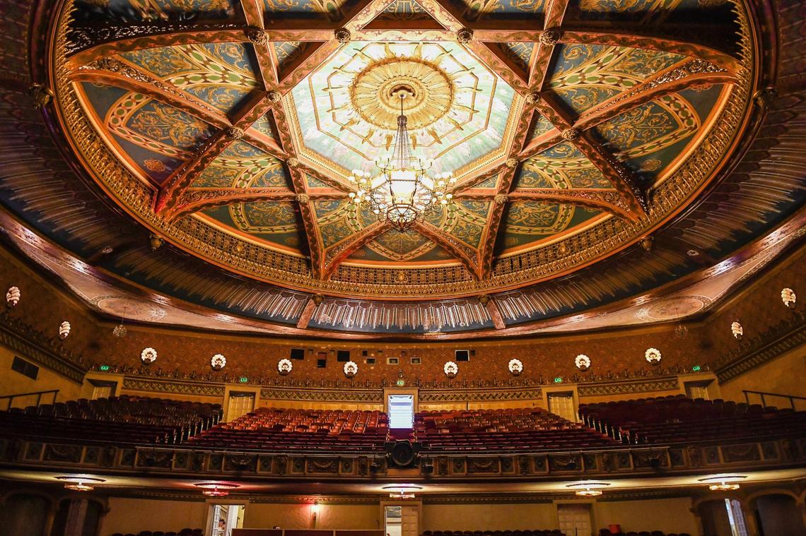 The ornate ceiling of the Warnors Theatre features a large wrought iron chandelier suspended above the second level of the 2,000-seat theatre originally built in 1928.