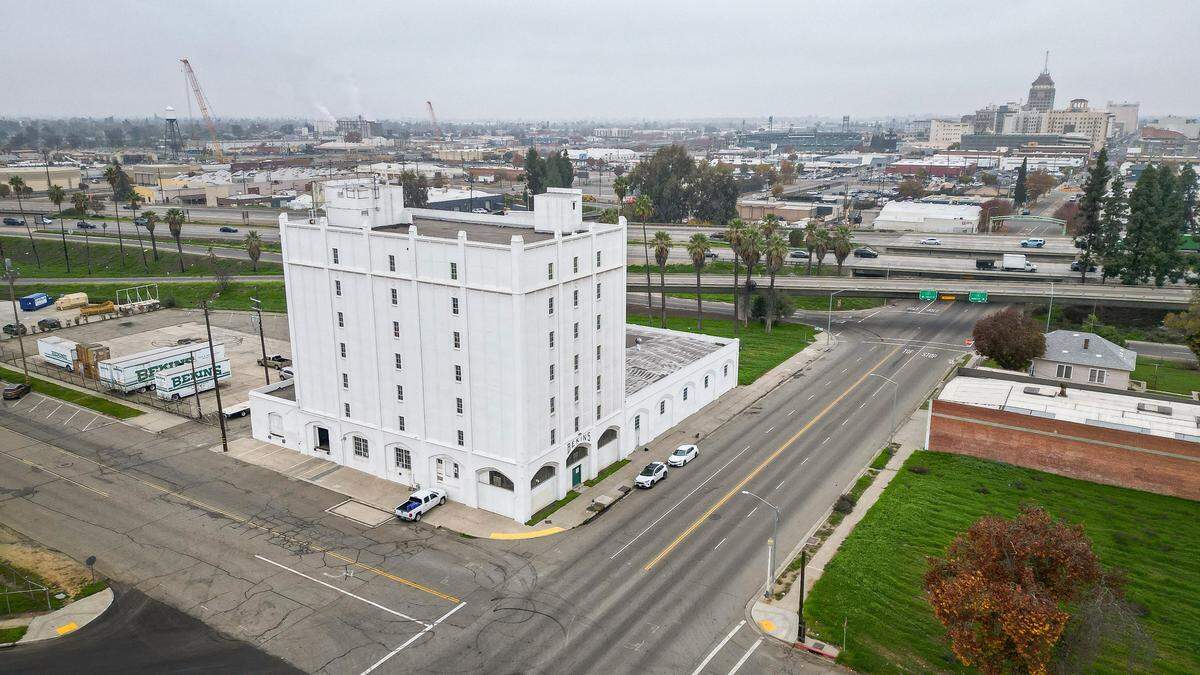Fresno's historic Bekins building on Van Ness Avenue and Monterrey Street, known for its Peelz Citrus mural visible from Highway 41, has been sold to local developers Reza Assemi and his business partner, Jaime Gonzalez.