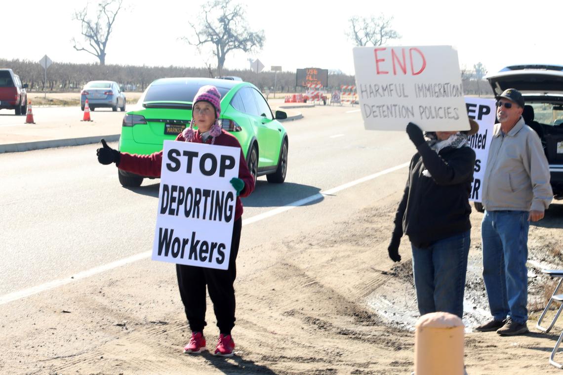 A couple of dozen people holding banners that read ‘Stop Deporting Workers” or “End Harmful Immigration detention policies” showed up to support immigrant farmworkers at the corner of South Laspina Street and East Paige Avenue as Ag show attendees drove by to the annual World Ag Expo on Tuesday.