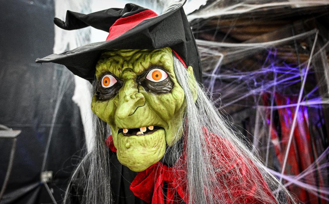 An animatronic witch stands ready to scare at Scare Factory in Fresno. The new haunt has three mazes and three escape rooms.