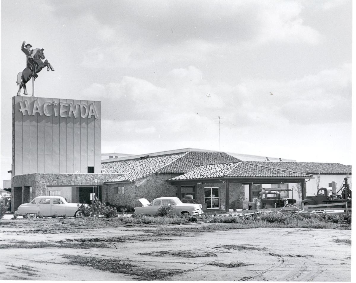 The exterior of the Hacienda Motel is shown in March 1954.
