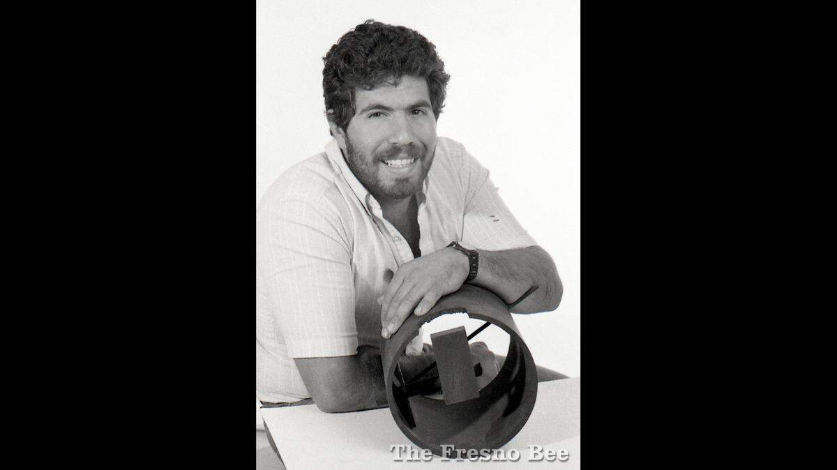 Ara Dolarian Jr. is shown with a metal construction for a July 1984 story in The Fresno Bee.