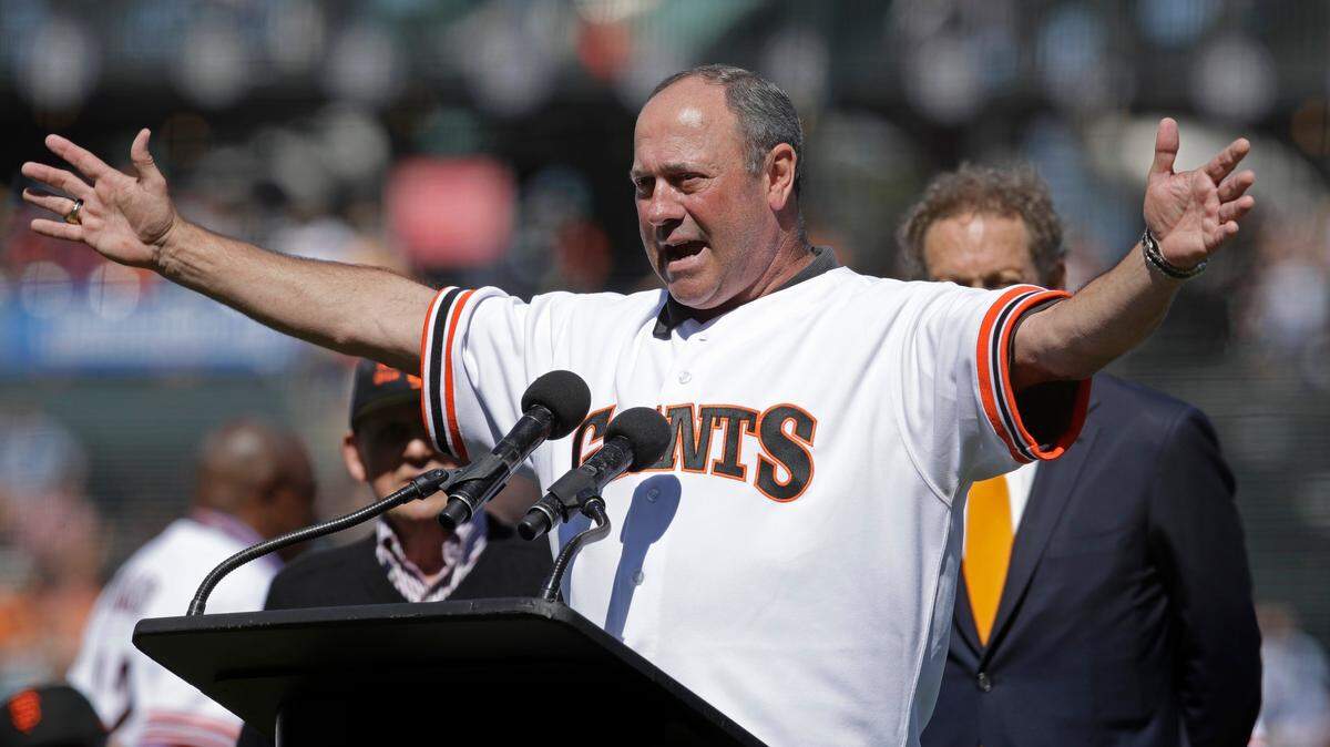 Former San Francisco Giants player Will Clark gestures to fans during a ceremony honoring the 1989 World Series team prior to a baseball game against the Philadelphia Phillies, Sunday, Aug. 11, 2019, in San Francisco.
