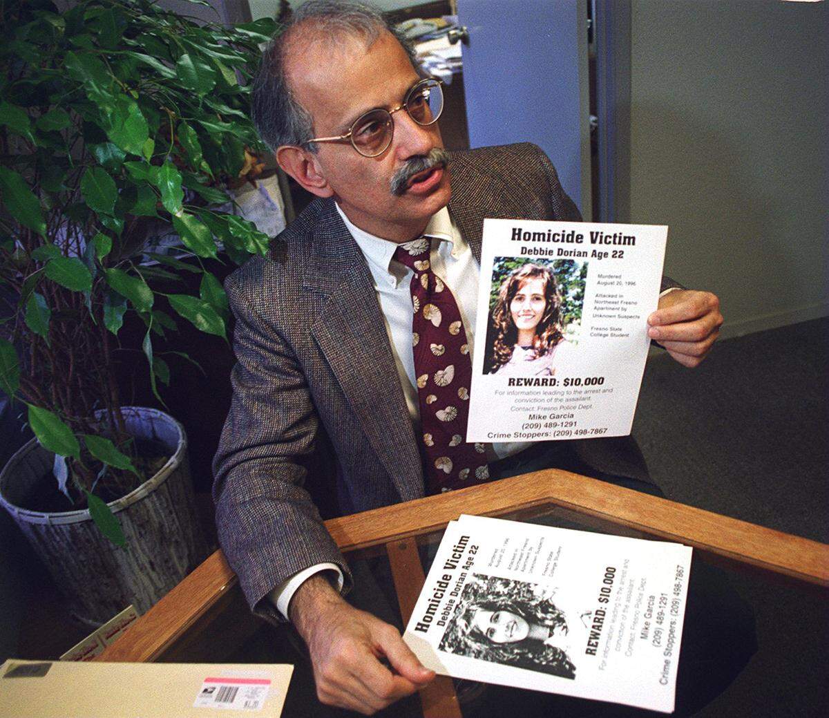 Peter Dorian, father of Debbie Dorian, is shown in March 1997 with reward flyers he put out looking for information on the killing of his daughter.
