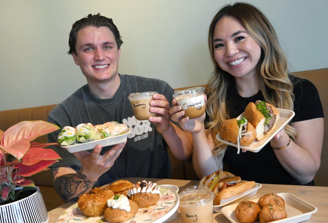 Selena Le, right, has opened Springly, a restaurant serving Vietnamese-inspired food and pastries with a partnership serving specialty coffee through Chase Benedettis’s Noc Box Coffee Studio, left. Along with the food and coffee offerings, fresh bouquets of flowers are for sale from Fresno Flower Market.