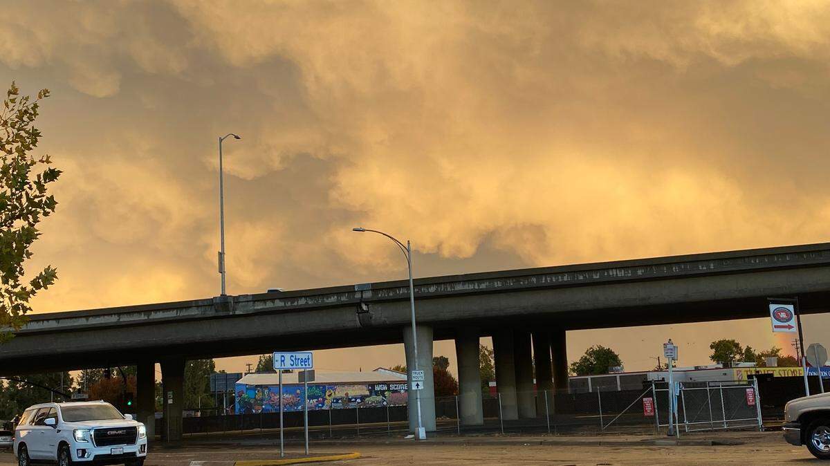 Storm clouds move through downtown Fresno, California on Monday, Nov. 11, 2024. A dust storm blanketed the area.