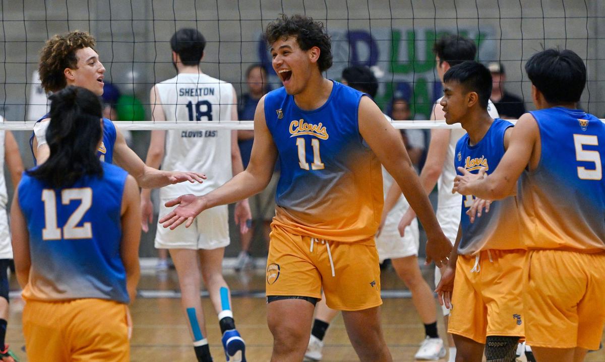 Clovis High’s Clovis East’s Addison Williams, center, celebrates a oint against Clovis East in the Central Section Division I volleyball championship Thursday, May 11, 2023 in Clovis.
