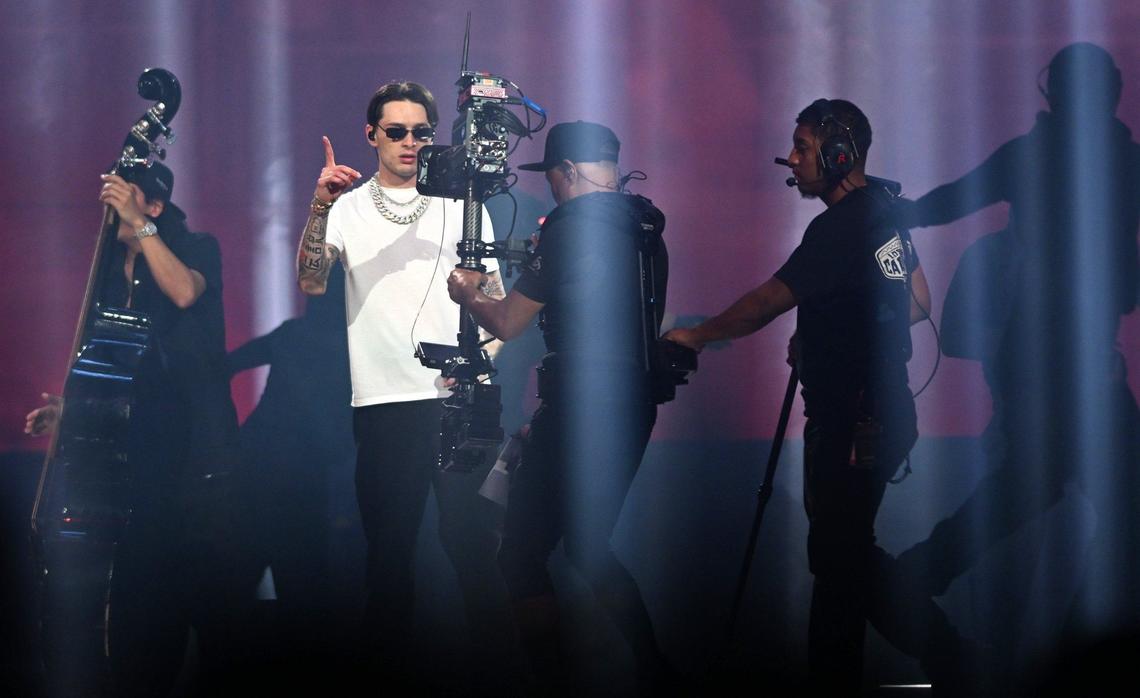 Peso Pluma plays to the camera on his Exodo Tour at the Save Mart Center Saturday night, Sept. 7, 2024 in Fresno.