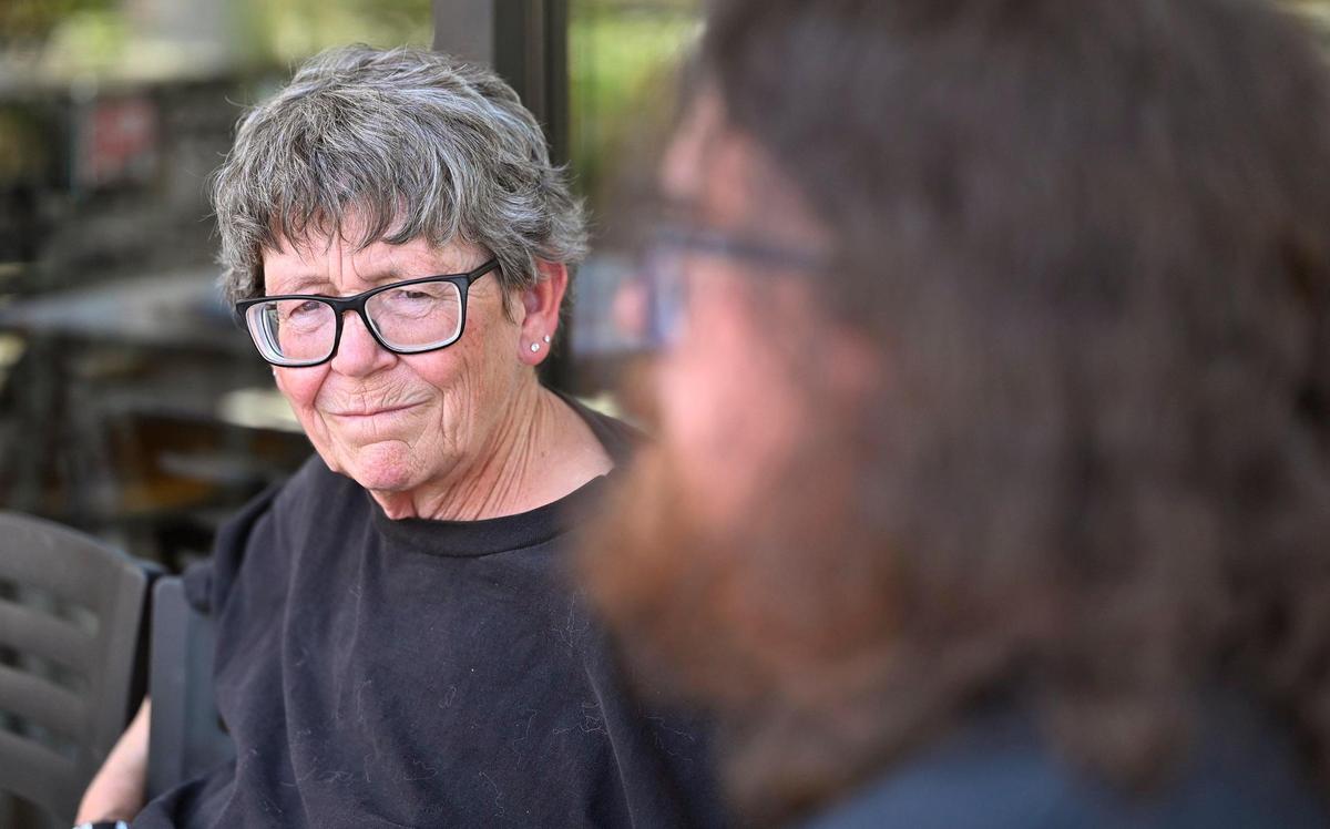 Wendy Johnson-Niblick, left, listens as her son John Robert Niblick outlines the terrifying raid by FBI and Fresno County Sheriff deputies at their Quail Lakes home in 2022 for which turned out to be a mistake. Photographed Wednesday, May 21, 2025 in Clovis.