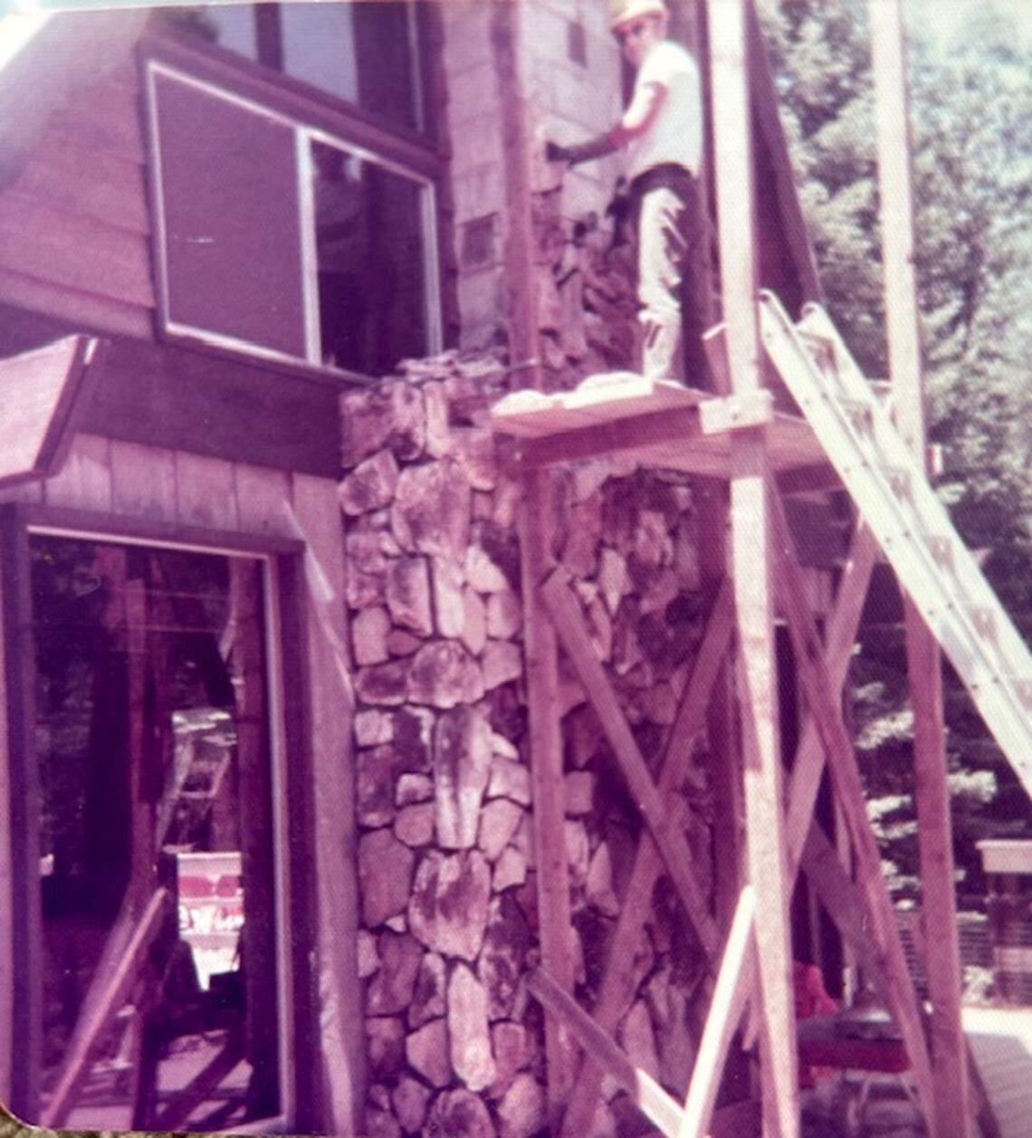 Art Lea, Susan Lea’s father, completes the exterior rock fireplace on the Pine Ridge area cabin in 1970. The family cabin was destroyed in the 2020 Creek Fire. 