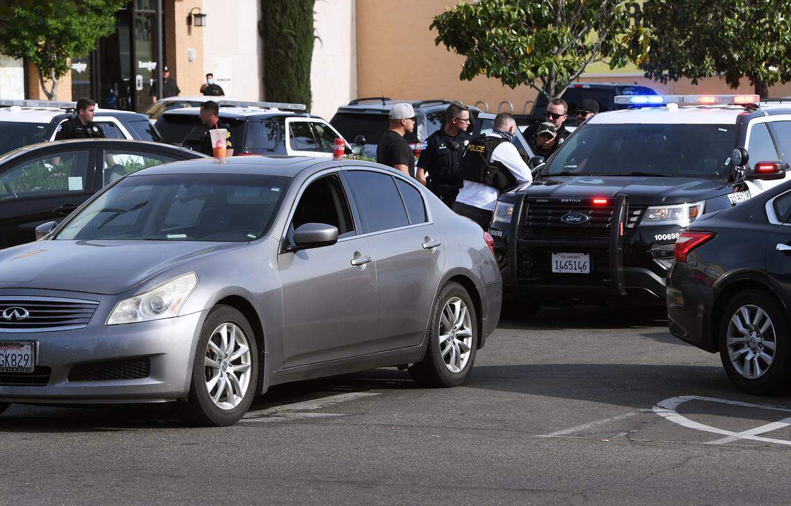 Three individuals were arrested Friday at Fashion Fair mall after Fresno Police found firearms inside the a silver sedan. One of the men had displayed a gun in his waistband in the mall, police said.