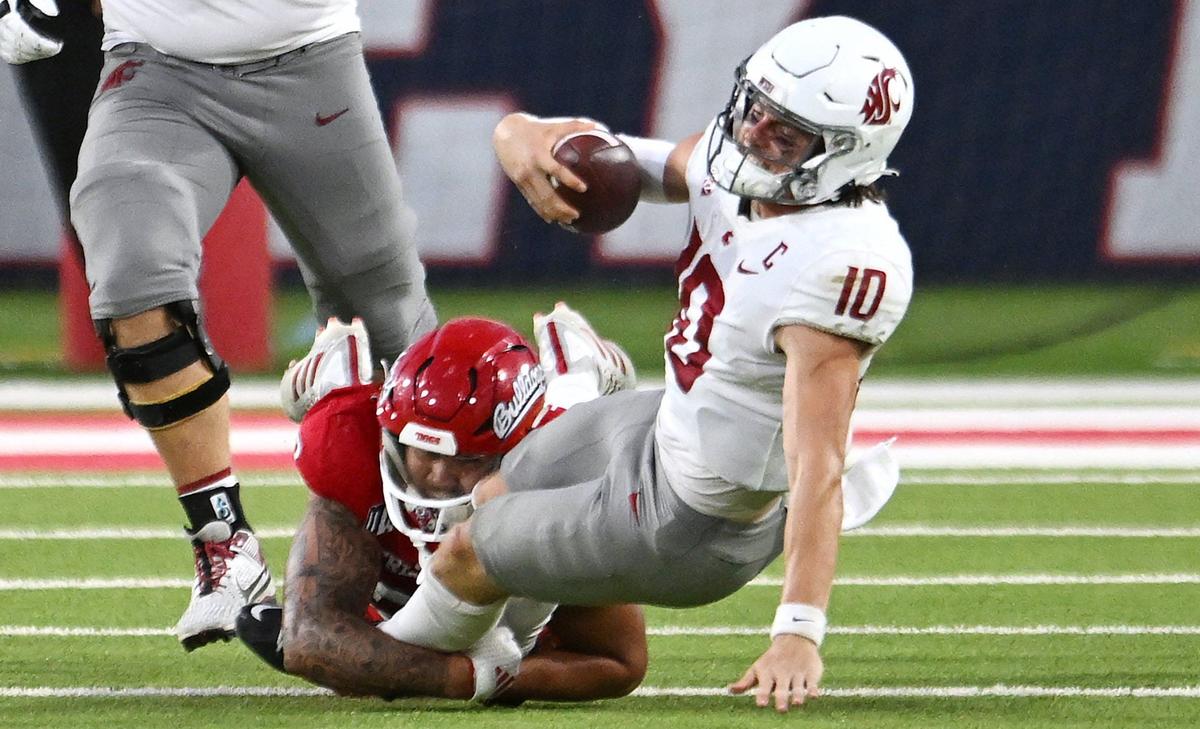 Fresno State’s Jacob Holmes sacks Washington State quarterback John Mateer in third quarter action Saturday, Oct. 12, 2024 in Fresno. Washington State beat Fresno State 25-17.
