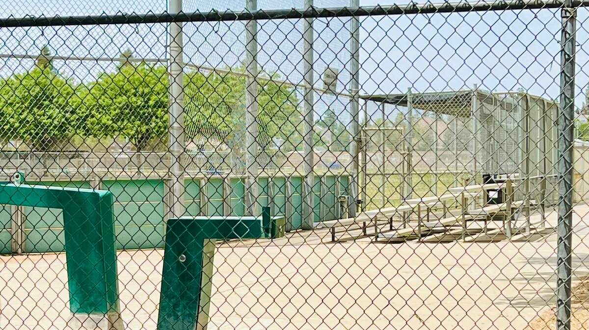 A hole was cut in a fence at Figarden Elementary School by an unknown suspect on May 26, 2022. The fence was repaired – reportedly the light gray metal seen in the middle. “It was cut top to bottom and he was stepping through when he was spotted,” said one Figarden Elementary School parent.