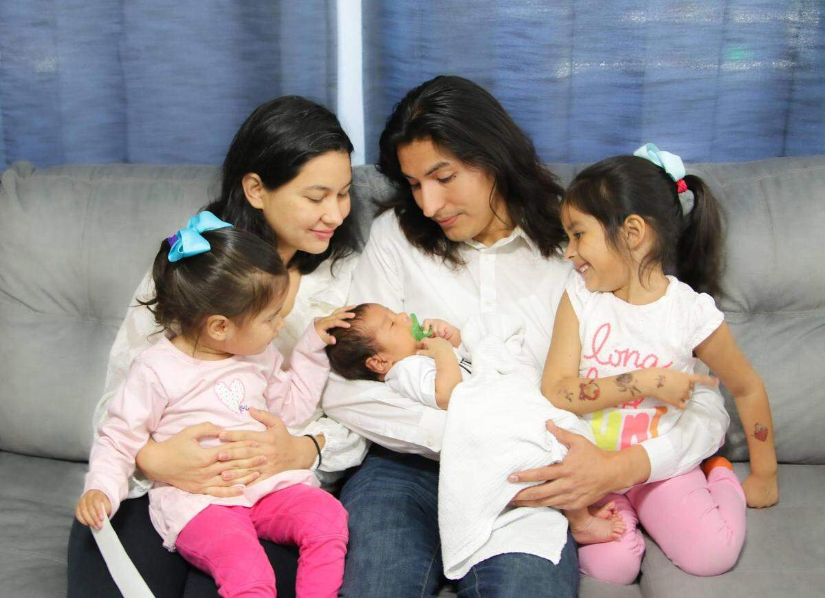 Max Vargas, (center) vice president of economic justice at the Latino Community Foundation, with his family.