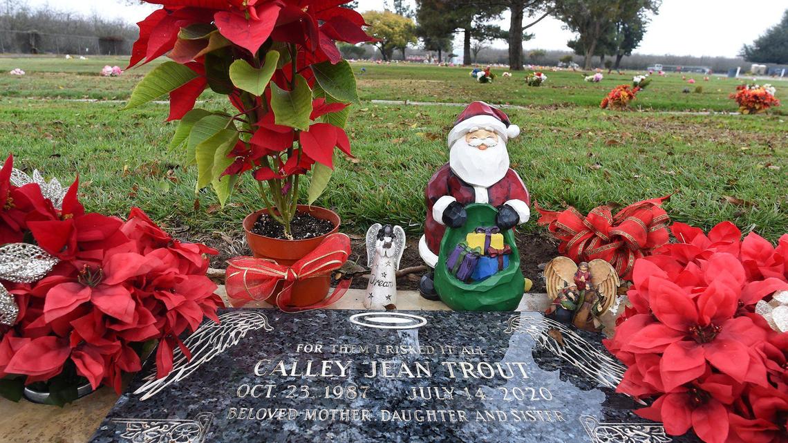 The headstone of the grave of Calley Jean Garay (her family chosed to use her maiden name of Trout), at the Chowchilla Cemetery, Dec. 31, 2020, with the message, “For Them I Risked It All,” referring the action she took by shielding her three children from the gunfire that took her life in mid-July.