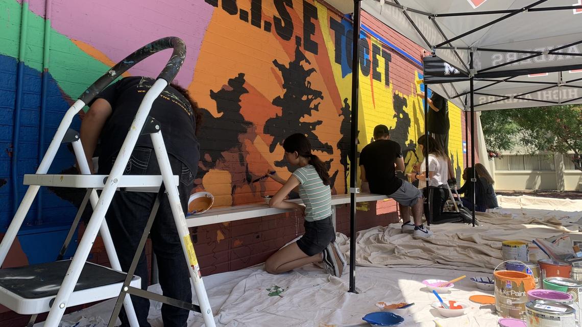 Fresno Unified students and local artists painted a mural at McLane High School and three other sites this summer as part of a summer mural program hosted by the school district.