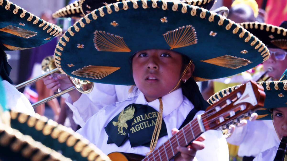 A young mariachi musician particpates in the Fiestas Patrias parade in downtown Fresno on Sept. 14, 2025.