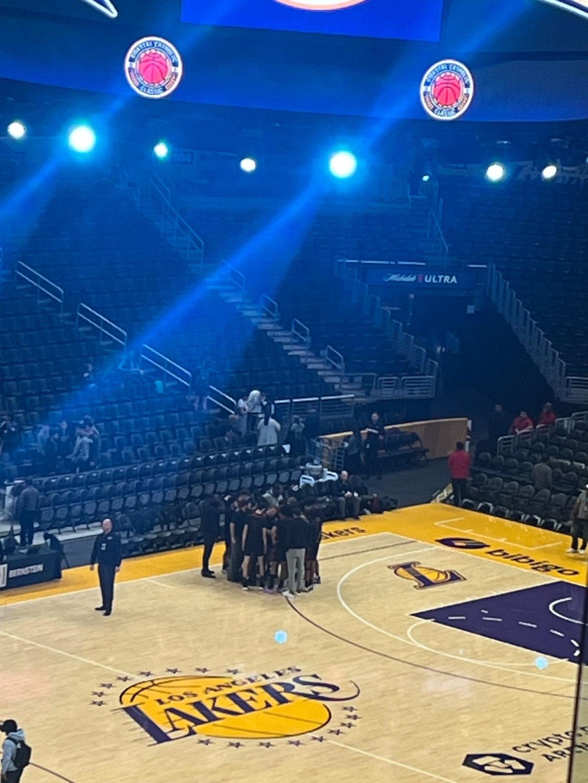 The San Joaquin Memorial boys basketball team huddle before its game on Saturday, Jan. 6, 2024 in Los Angeles, California.