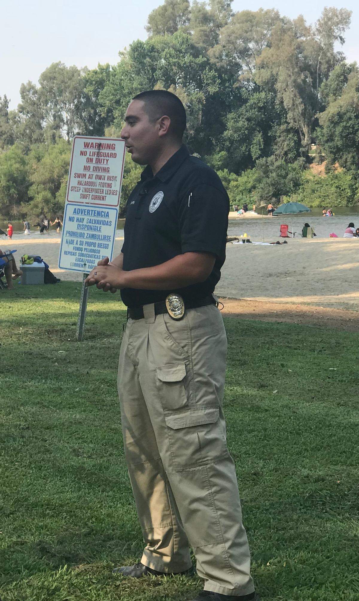 Reedley police Officer Daniel Ybarra performed CPR on a woman who nearly drowned at Reedley Beach on July 16. At a reunion 10 days later, he met with the woman and another man who almost drowned the same day.
